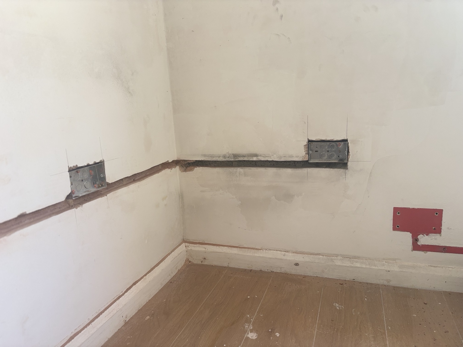 Wall chasing and socket back boxes during first-fix rewiring