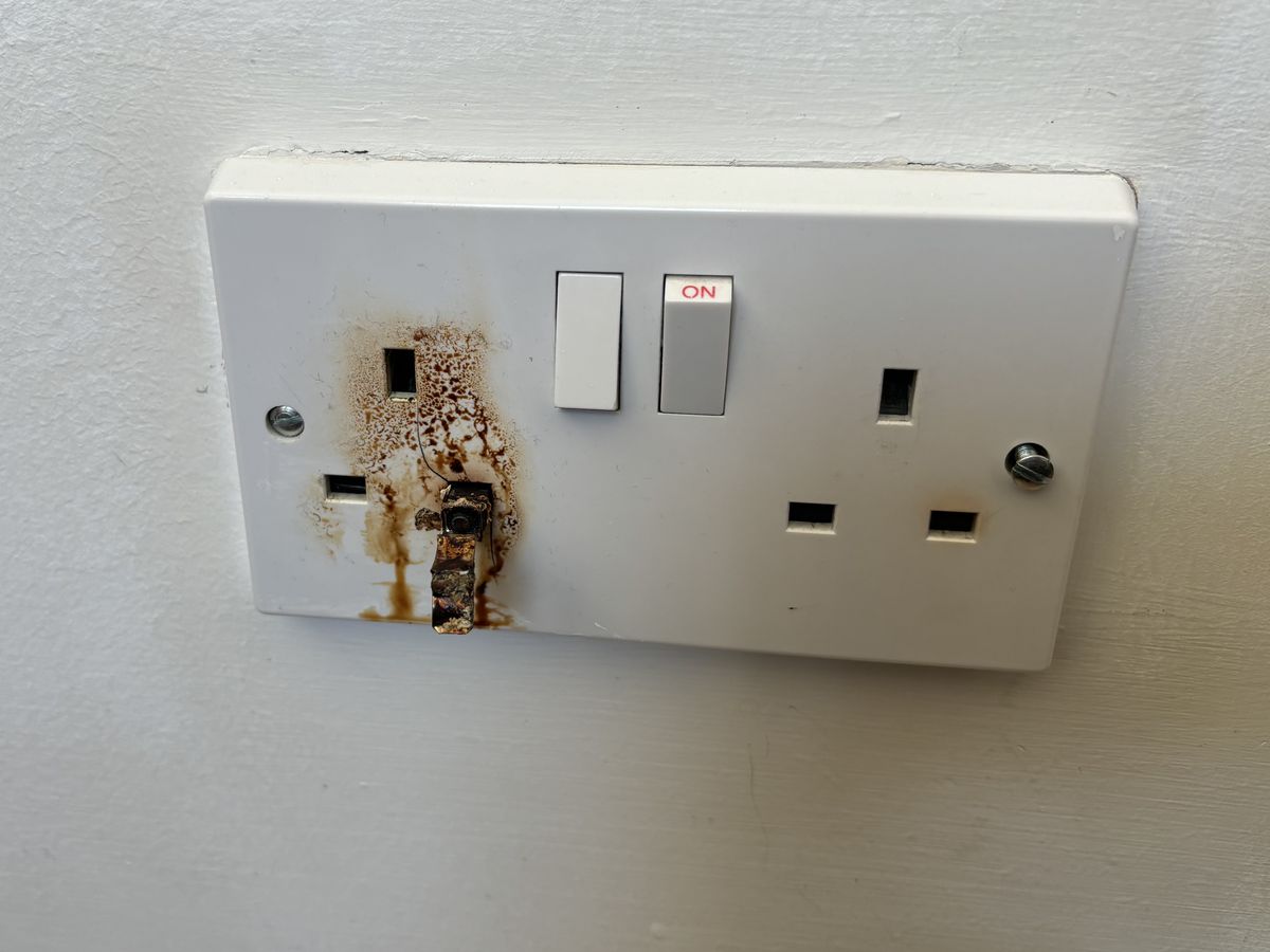 Burnt double socket in a London home